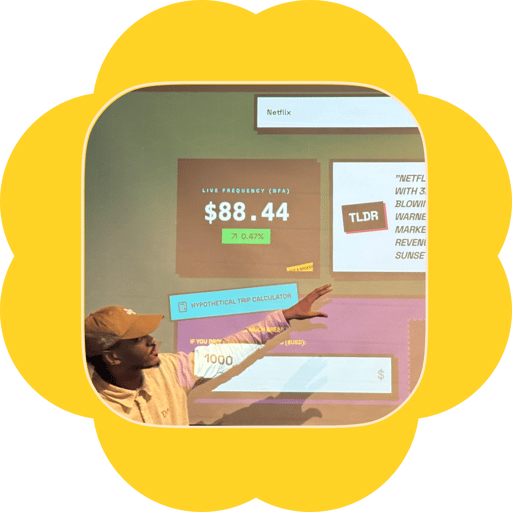 A member reaching toward a projected dashboard of live financial and open-data APIs